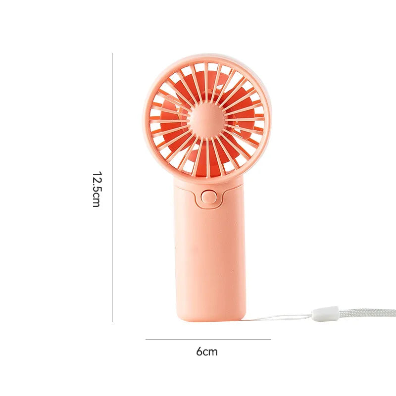 🌬️ Mini ventilateur de poche à piles – Léger, puissant et idéal pour rester au frais partout ! ☀️